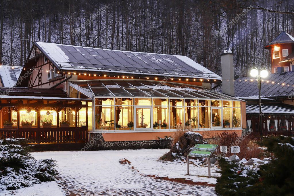 Alpine spa with outdoor pool and mountain views